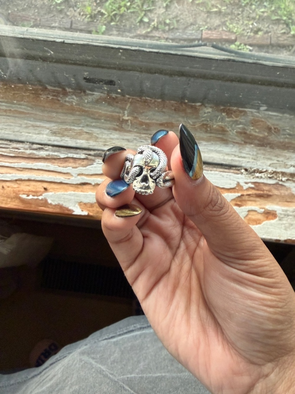 Awe Inspired Silver Snake & Skull Statement Ring in Metallic Silver